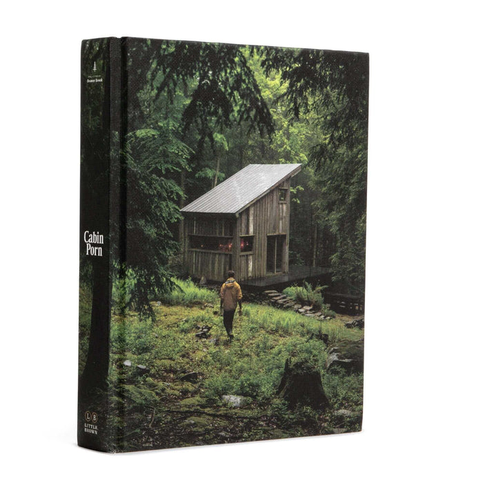 Cabin Porn book cover featuring a rustic cabin in a forest, from Cabin Depot. Ideal for those seeking rural escape inspiration.