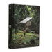 Cabin Porn book cover featuring a rustic cabin in a forest, from Cabin Depot. Ideal for those seeking rural escape inspiration.