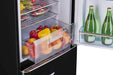 Interior of Unique 9 Cu/Ft Bottom Mount Retro Refrigerator with vegetable drawer and bottles, available at Cabin Depot.