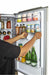 Person organizing drinks inside a Unique 12 Cu/Ft Prestige Electric Bottom Mount Refrigerator from Cabin Depot - Stainless Steel interior view.