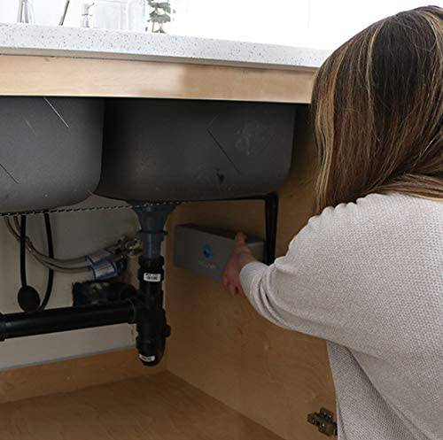 Acuva ArrowMax 1.2 UV-LED water purifier installation under a kitchen sink, ideal for off-grid homes and cabins, Cabin Depot product.