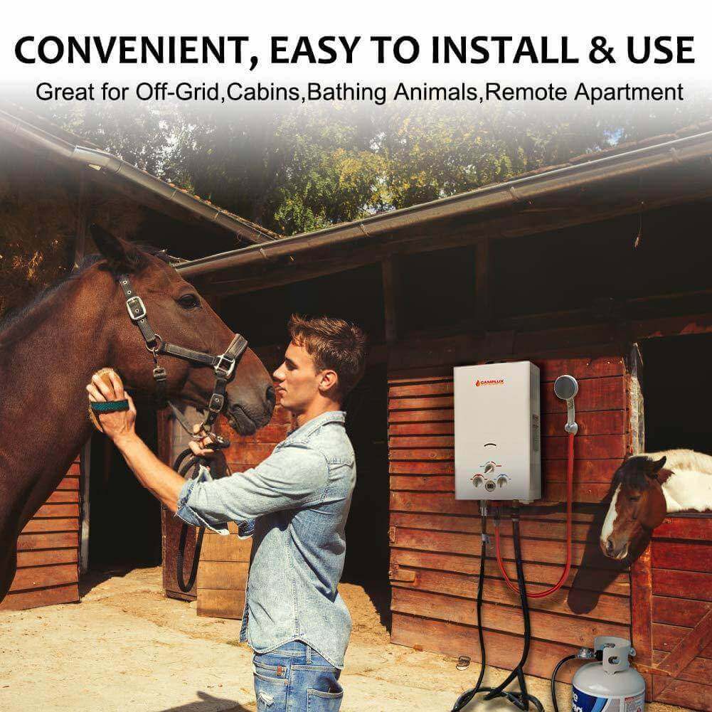 Man using Camplux 8L Propane Outdoor Tankless Water Heater at barn, ideal for cabins, off-grid, and bathing animals, available at Cabin Depot.