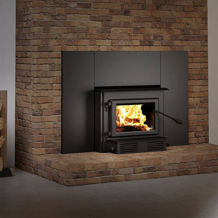 Century CW2900 wood stove with faceplate in brick hearth, featuring a large firebox and Cabin Depot quality.