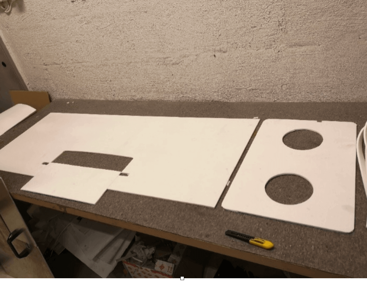 Cinderella Comfort Arctic Insulation Kit parts on workbench for cold climate toilets, available at Cabin Depot.