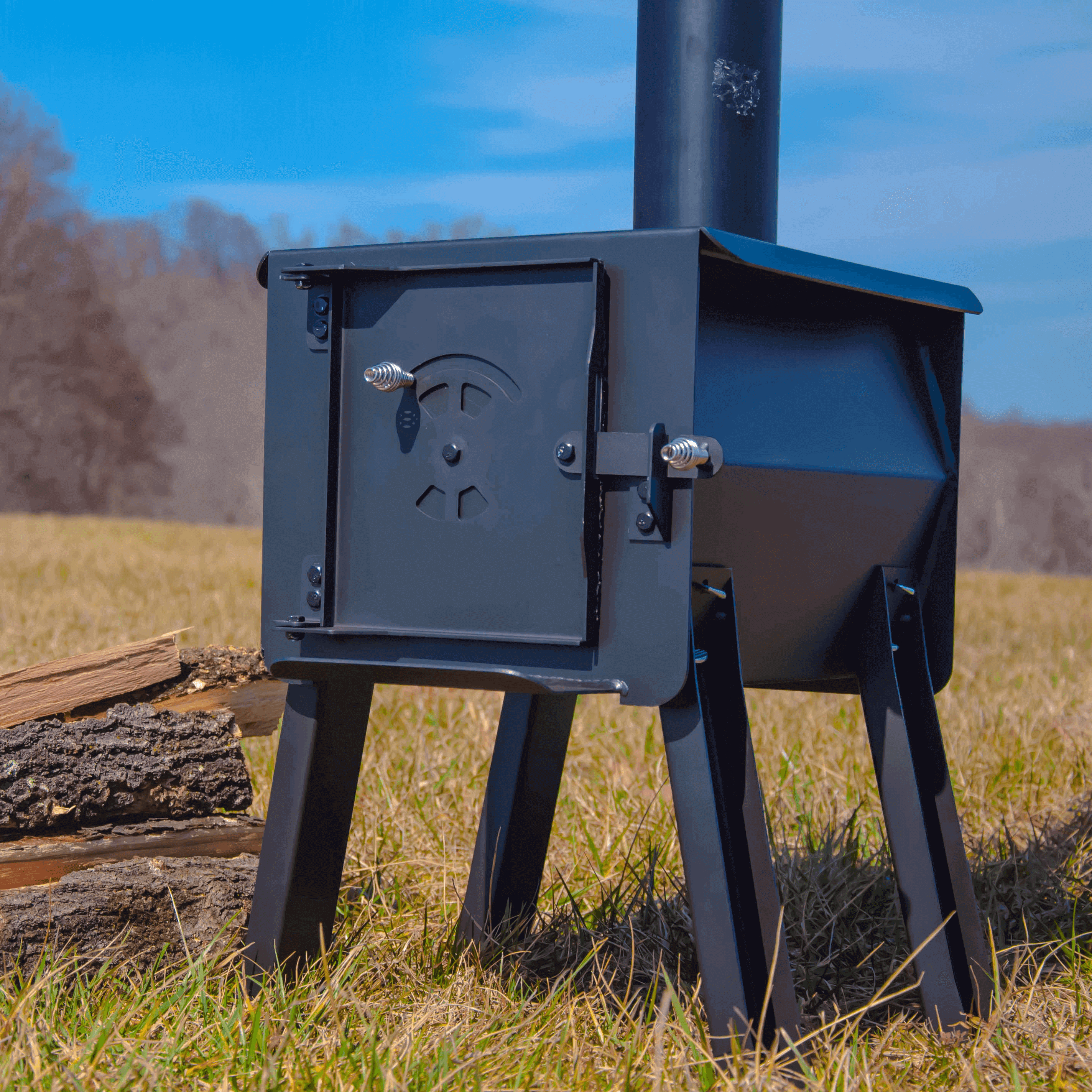 Englander Black Bear Camp Stove, portable for camping and ice fishing, available at Cabin Depot, featuring sturdy 12-gauge steel construction.