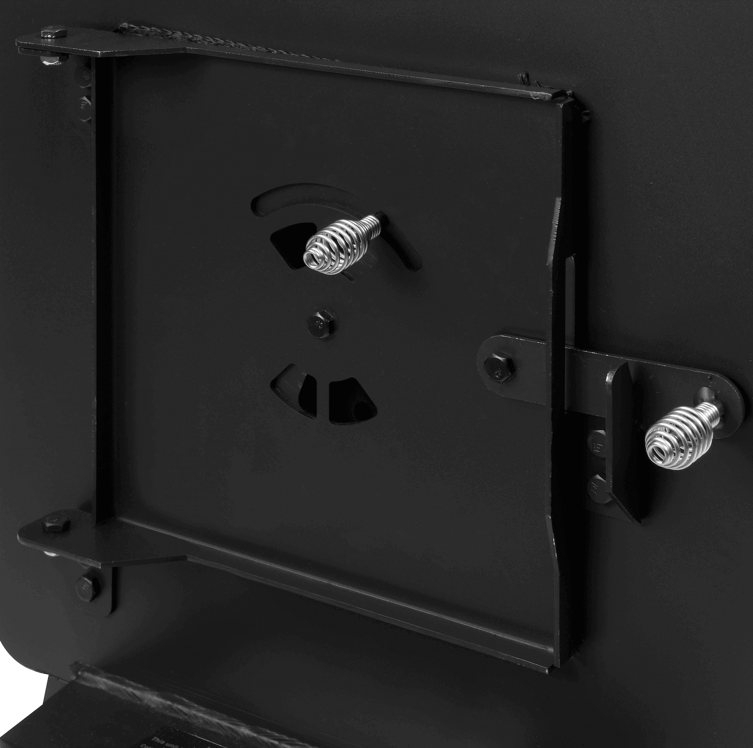 Englander Black Bear Camp Stove door detail at Cabin Depot, highlighting durable 12-gauge steel construction and efficient vent design.