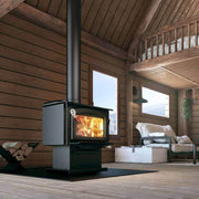 Drolet Escape 1800 Wood Stove heating a cozy cabin interior, available at Cabin Depot. EPA certified, 8-hour burn time, free shipping.
