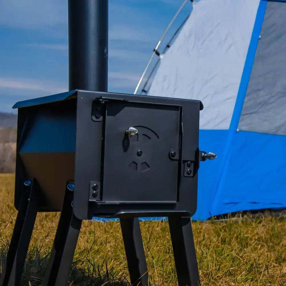 Englander Cub Wood Stove by Cabin Depot, portable with removable legs, ideal for camping and outdoor use with durable steel construction.