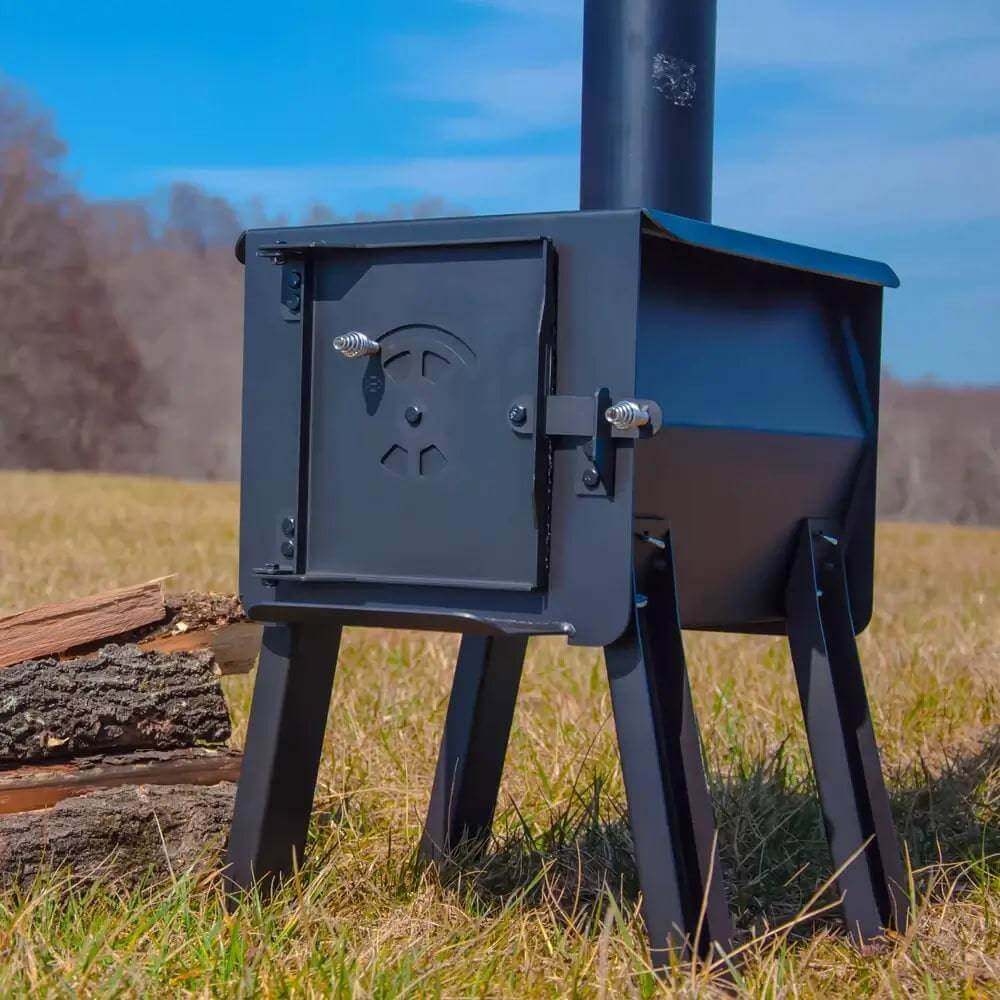Englander Cub wood stove by Cabin Depot with welded steel construction, ideal for camping and outdoor use, shown with detachable legs.
