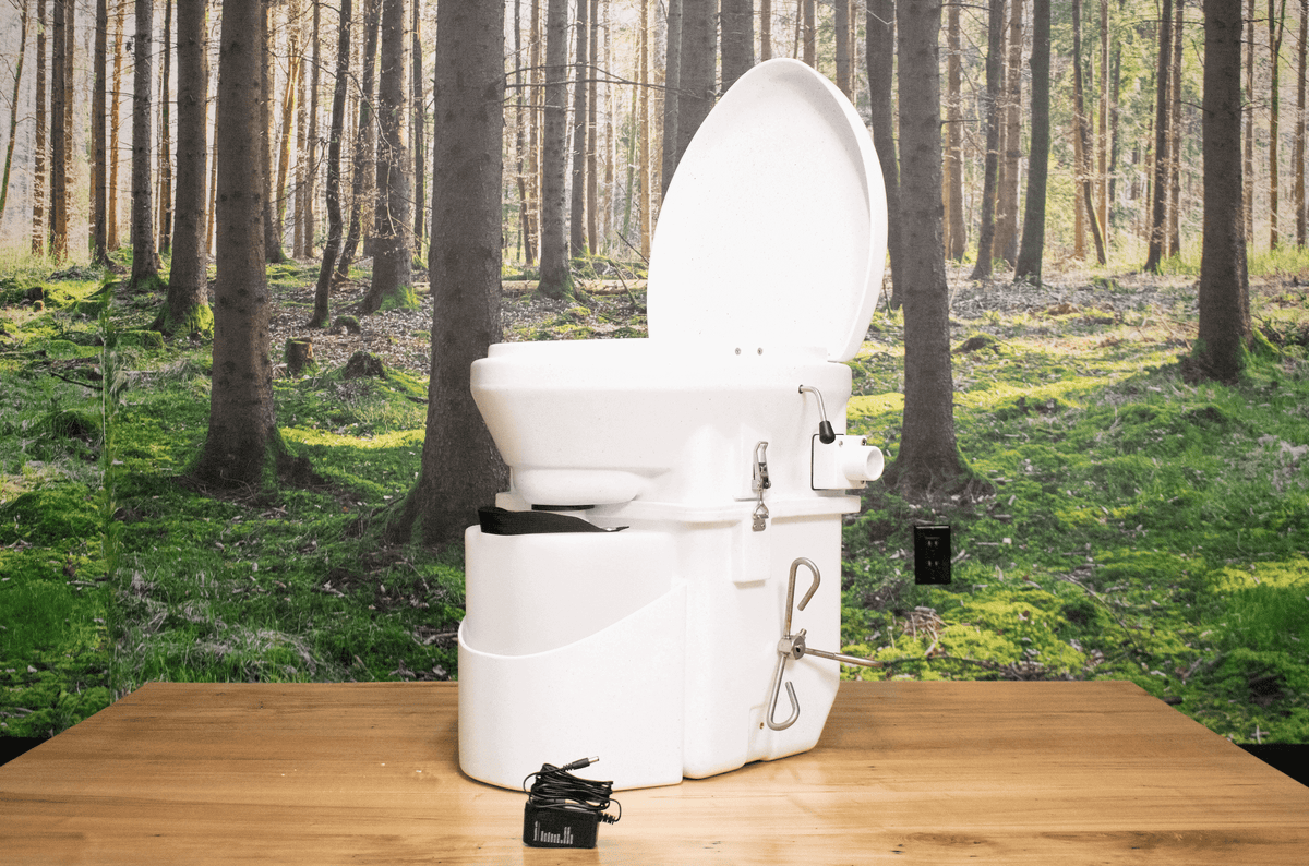 Nature's Head Composting Toilet with Foot Spider Handle available at Cabin Depot, ideal for off-grid living. Free shipping in Canada.