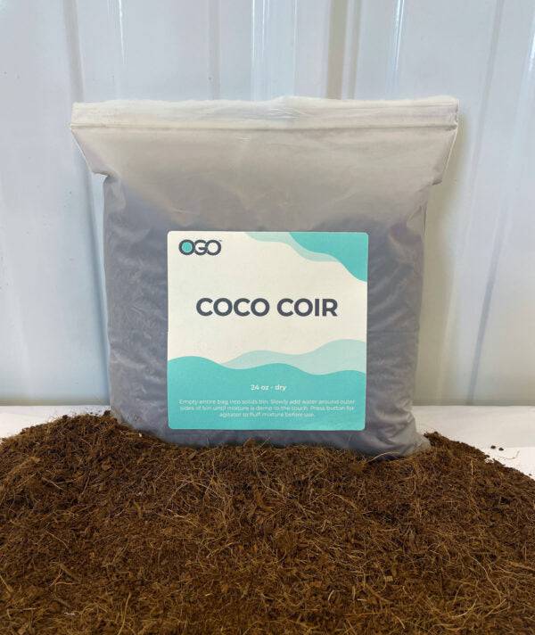 Ogo Coco Coir bag on display with loose coir substrate, ideal for composting and gardening use.
