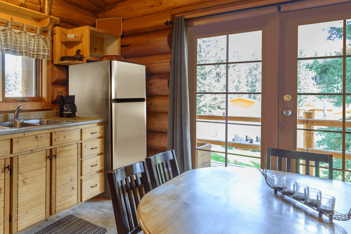 SunStar 16CU Solar/DC Refrigerator in log cabin kitchen from Cabin Depot