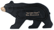 Hand-carved black bear cribbage board from Cabin Depot, with hidden peg storage in the tail, perfect for rustic cabin decor.