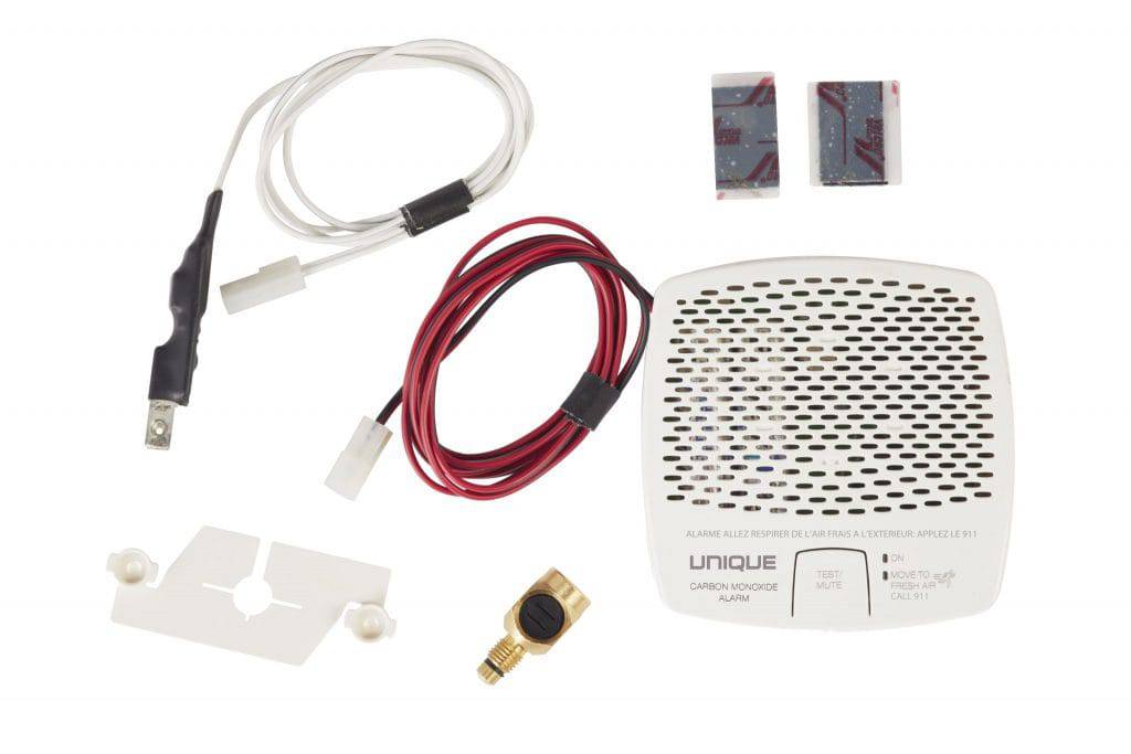 Cabin Depot carbon monoxide alarm kit for propane fridge with safety shut-off, includes battery-powered detector and accessories.
