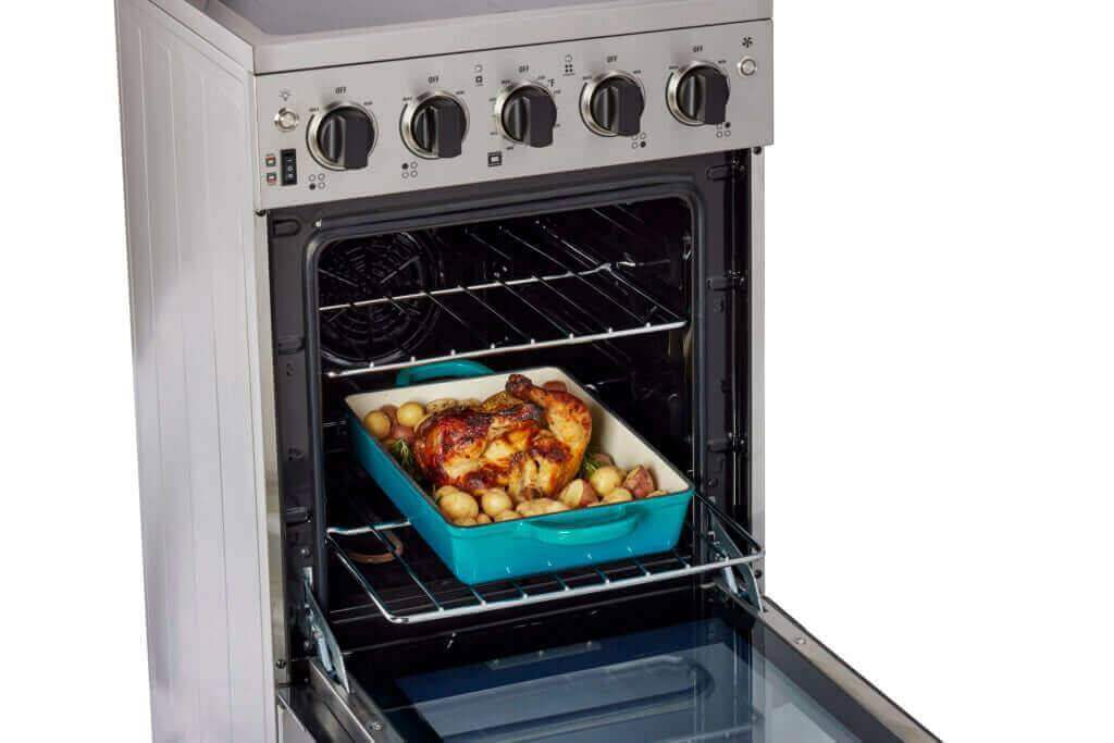 20-inch stainless steel Prestige convection range baking chicken, sold by Cabin Depot.
