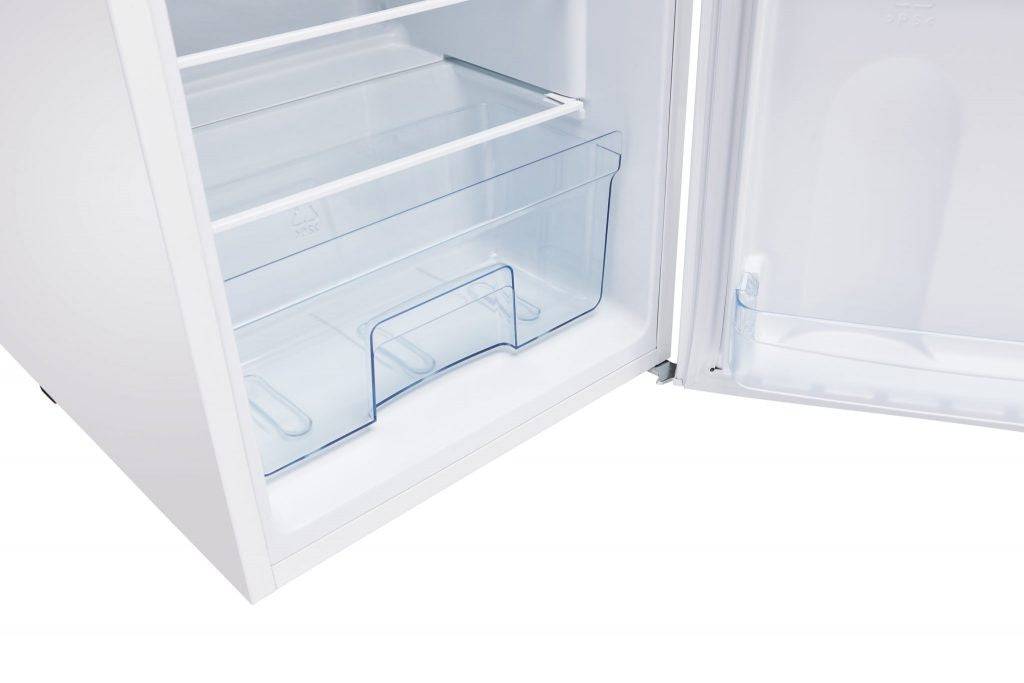 Interior view of Unique 6 Cu/Ft Solar DC Fridge with Freezer open, showing shelves and crispers. Ideal for energy-efficient cooling. Cabin Depot.