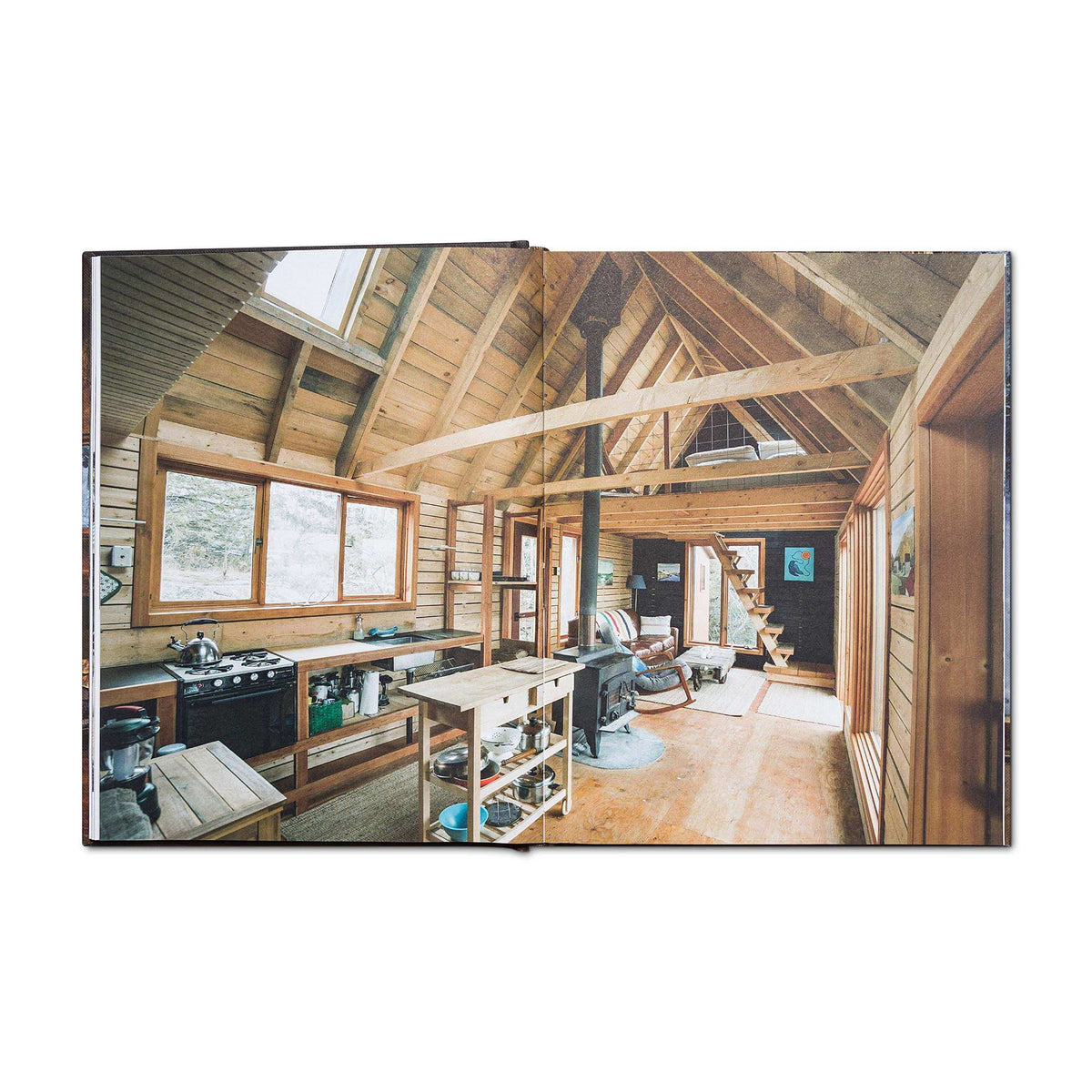 Interior of tranquil cabin from 'Cabin Porn Inside' book, showcasing rustic design for home inspiration. Available at Cabin Depot.