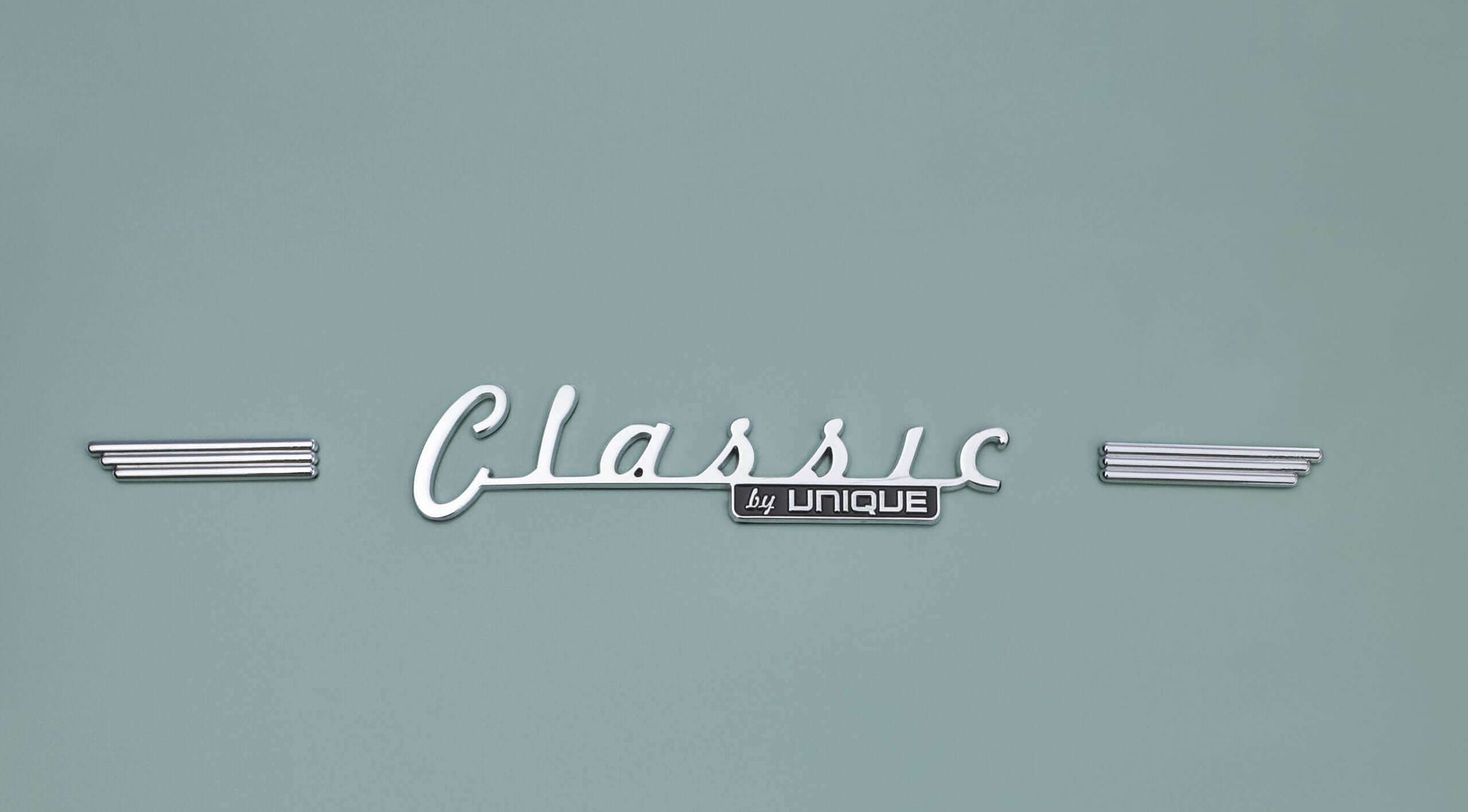 Classic by Unique logo for Retro 12 cu ft bottom-mount fridge at Cabin Depot