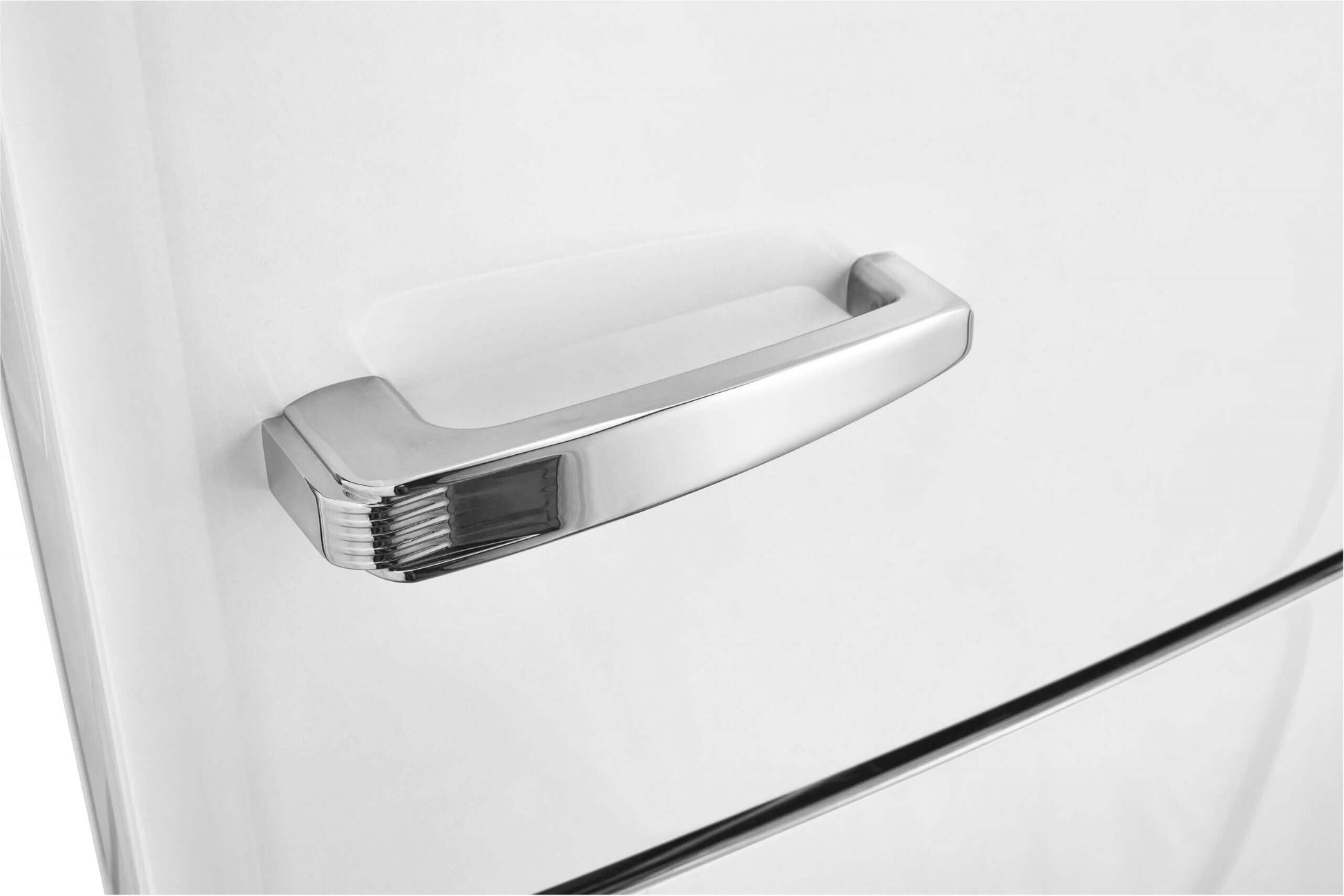Close-up of Unique Classic Retro refrigerator door handle at Cabin Depot for a vintage kitchen look.