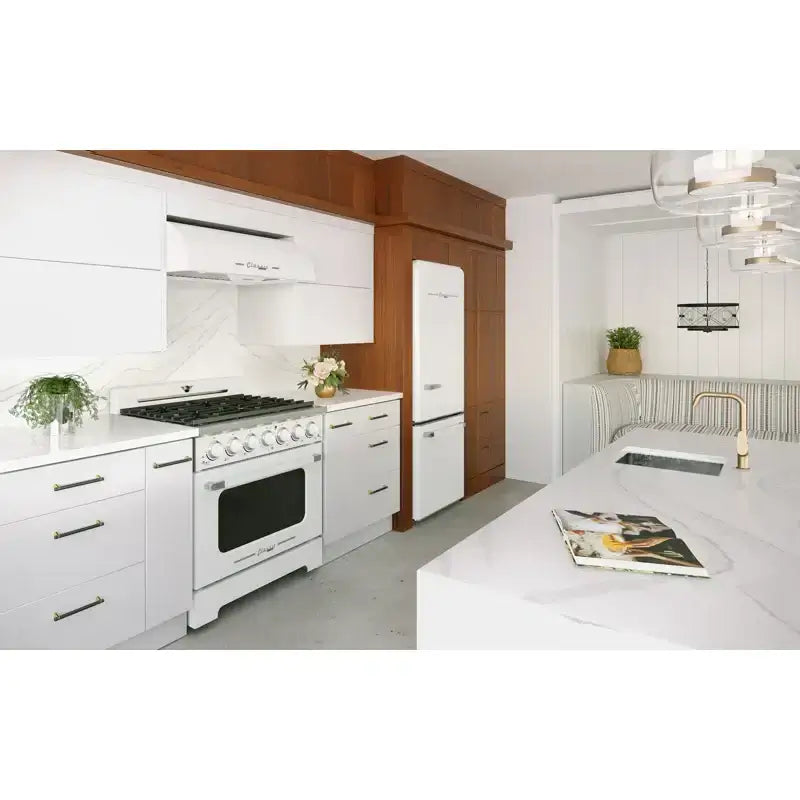 Modern kitchen featuring the Unique 36" Classic Retro Range Hood with chrome accents, available at Cabin Depot.