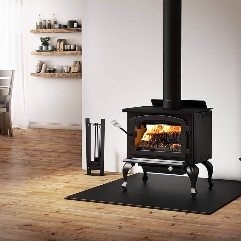 Drolet Columbia II Wood Stove in modern living space, eco-friendly heating from Cabin Depot, up to 65,000 BTU/h for areas up to 1,800 ft².